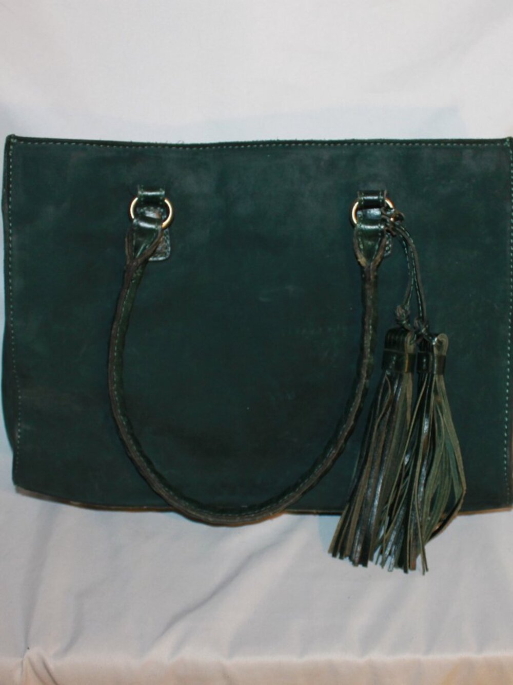 Patricia Nash Primrose satchel in a dark green suede leather.